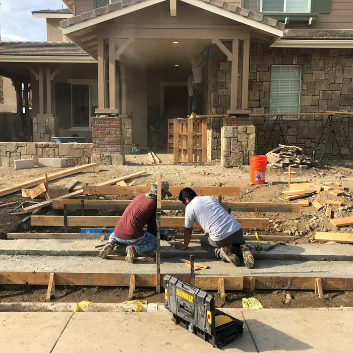 Valley Pacific Landscape crew building a custom hardscape project